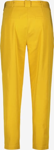 TAIFUN - regular Pantalón plisado en amarillo