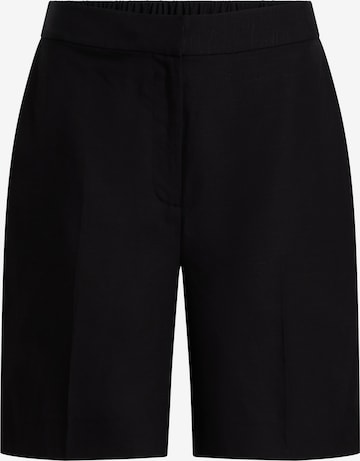 Calvin Klein Trousers with creases in Black: front