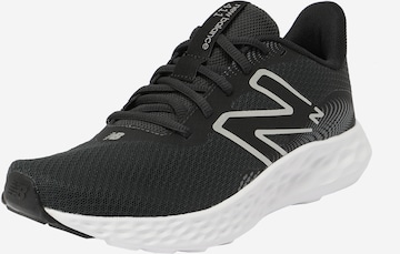 Chaussure de course '411' new balance en noir : devant