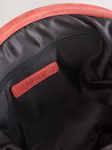 Pochette di Next in arancione