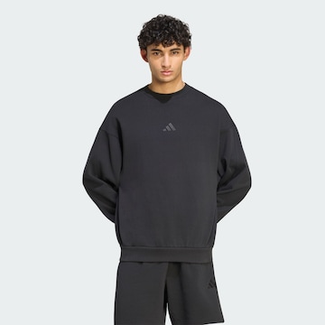 ADIDAS SPORTSWEAR - Camiseta deportiva en negro: frente