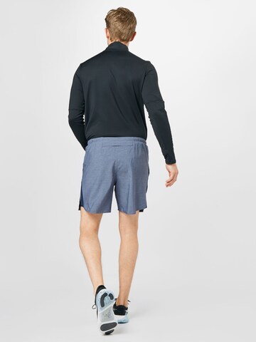 NIKE Regular Workout Pants 'Challenger' in Blue