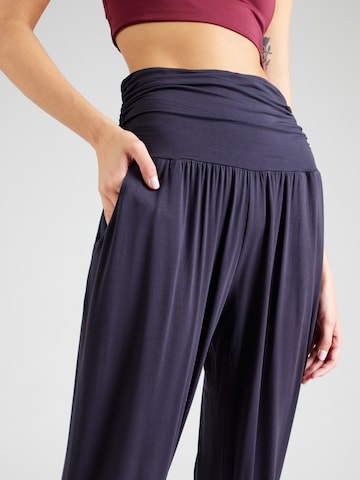 Effilé Pantalon de sport CURARE Yogawear en bleu