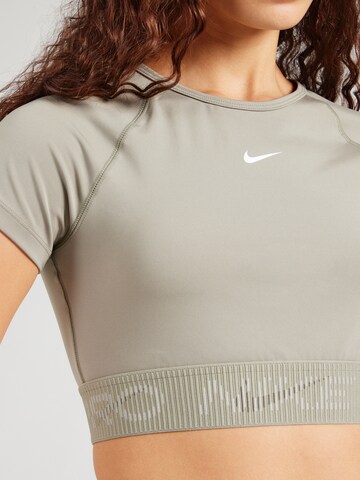 NIKE - Camiseta funcional en verde