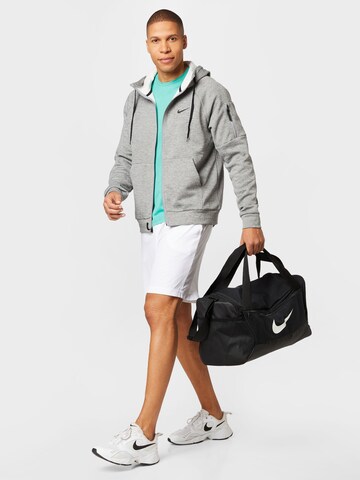 NIKE Sportsweatjacke in Grau