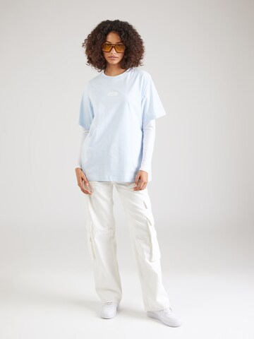 Nike Sportswear T-shirt 'SWOOSH' i blå
