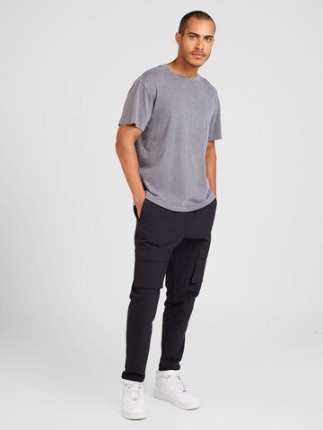 regular Pantaloni sportivi di Reebok in nero
