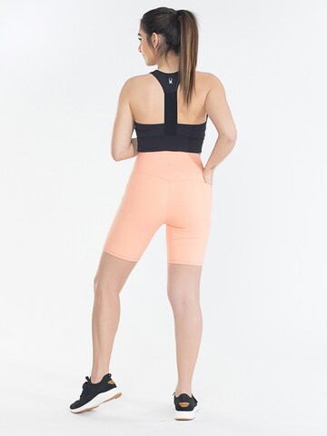 Spyder Skinny Sportbroek in Oranje