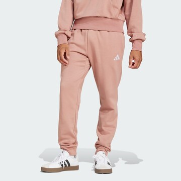 ADIDAS SPORTSWEAR Tapered Workout Pants 'Essentials Feelcozy' in Pink: front