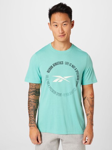 T-Shirt fonctionnel Reebok en bleu : devant