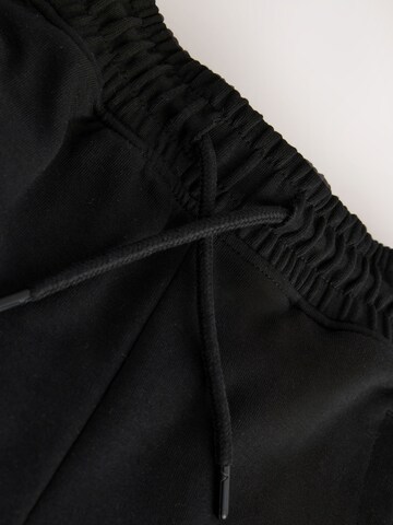 Next Конический (Tapered) Штаны в Зеленый