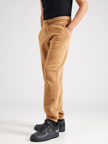 Effilé Pantalon HOLLISTER en marron : devant