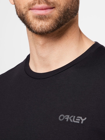 OAKLEY Funksjonsskjorte 'Repeat' i svart