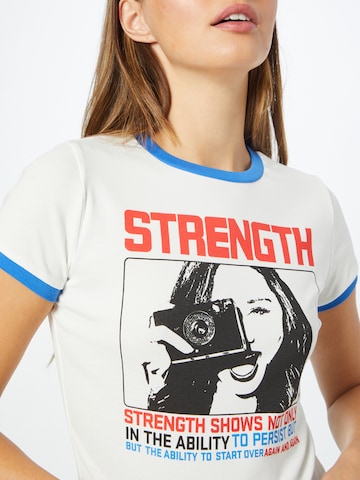 Edikted Tričko 'Strength' - biela