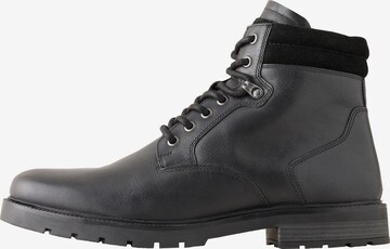 Next - Botas con cordones en negro: frente