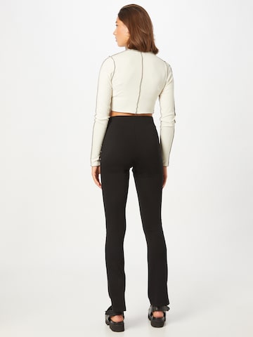 Flared Leggings 'Milly' di ABOUT YOU Limited in nero