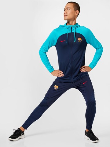 NIKE Tapered Sportbroek in Blauw