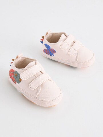 Neonato di Next in beige