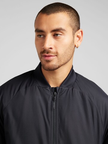 UNDER ARMOUR Kurtka sportowa 'UNSTOPPABLE' w kolorze czarny