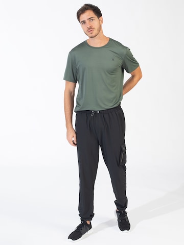 Regular Pantaloni sport de la Spyder pe negru