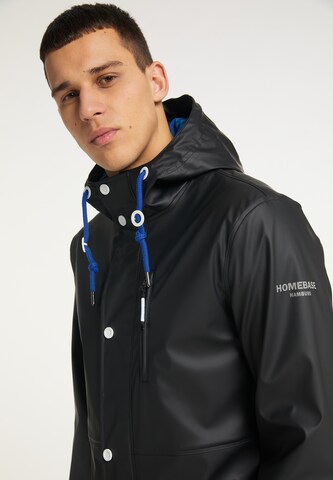 HOMEBASE Regenjacke in Schwarz