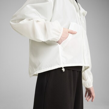 Veste de sport 'Wardrobe Ess' PUMA en blanc