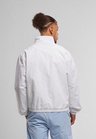 Veste mi-saison 'Essential' Karl Kani en blanc