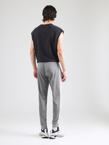 ADIDAS SPORTSWEAR Tapered Sports trousers in Black