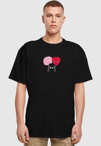 Merchcode Shirt 'Hugs & Love - Emotional Balance' in Zwart: voorkant