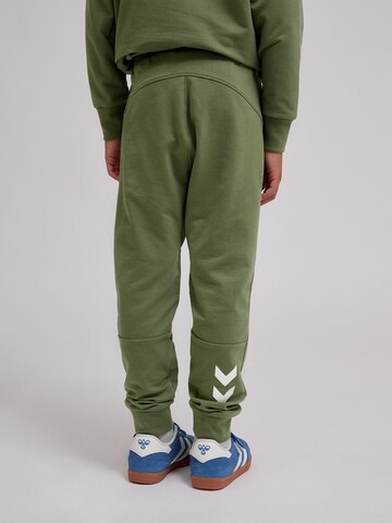 Hummel Tapered Sports trousers in Green