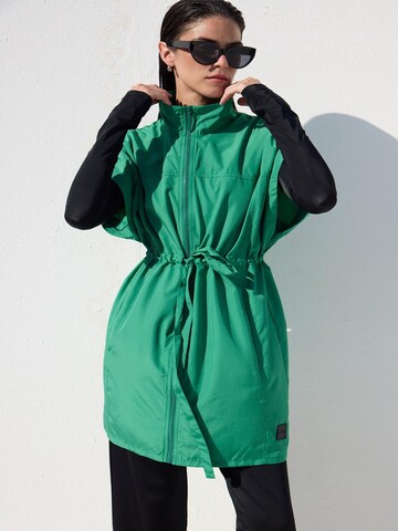MANUKA Swimsuit dress in Green