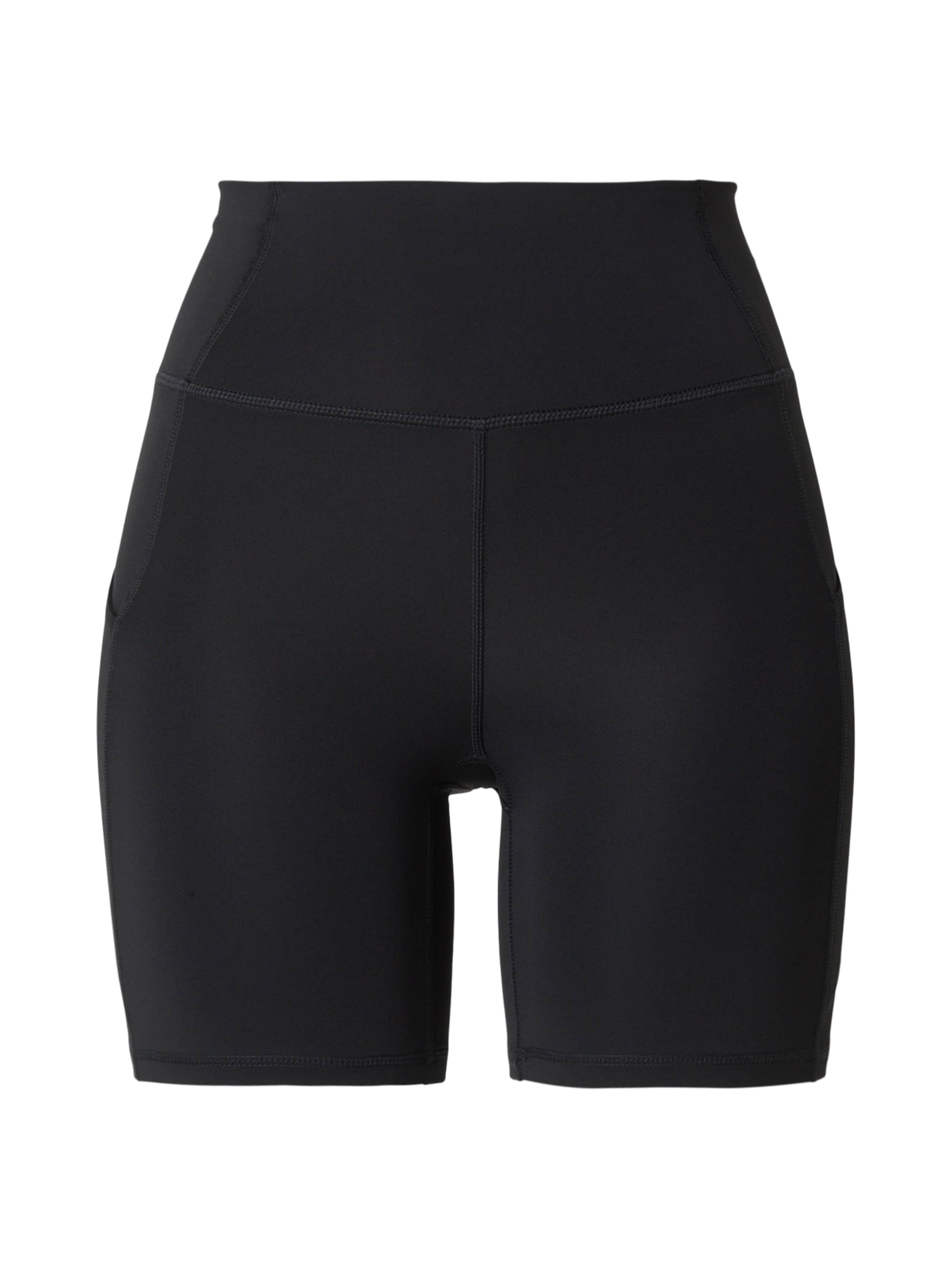 Skinny Pantaloni sport de la Fabletics pe negru: față
