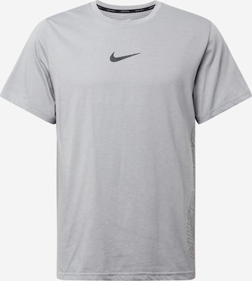 NIKE Functioneel shirt 'Burnout' in Grijs: voorkant