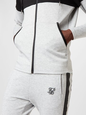 SikSilk - Ropa para correr en gris