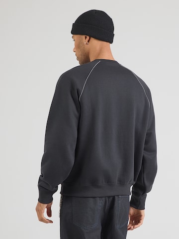 Sweat-shirt 'Trackside' new balance en noir