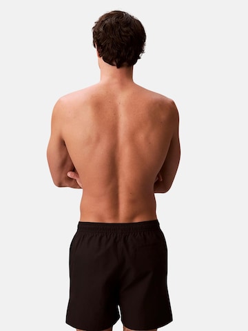 Shorts de bain 'CALVIN KLEIN MEDIUM DRAWSTRING Costumi da bagno' Calvin Klein en noir