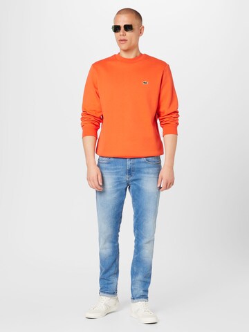 LACOSTESweater majica - narančasta boja