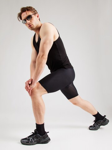 Skinny Pantalon de sport UNDER ARMOUR en noir