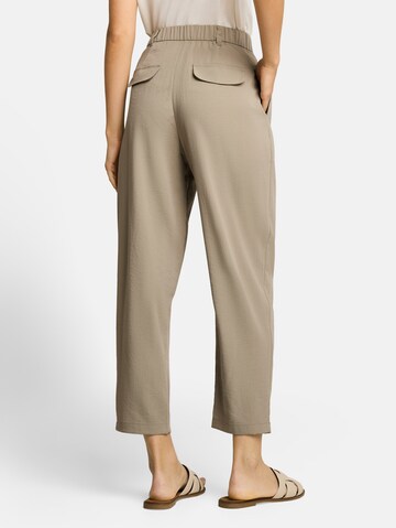 TOM TAILOR Loose fit Pants in Green
