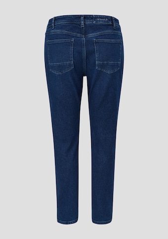 Jeans with triangle logo on back pocket sales