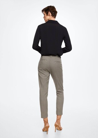 Coupe slim Pantalon à plis 'Warm' MANGO en marron