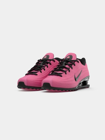 Baskets basses 'SHOX Z' Nike Sportswear en rose