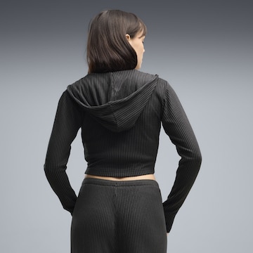 PUMA Sportstrickjacke in Schwarz