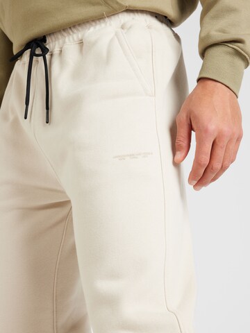 Abercrombie & Fitch Zúžený Kalhoty – béžová