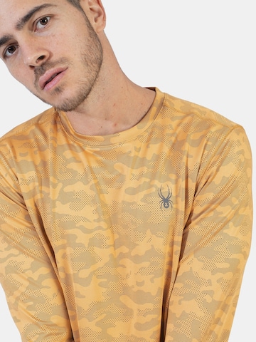 T-Shirt fonctionnel Spyder en or