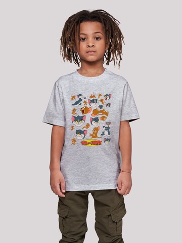 F4NT4STIC T-Shirt 'Tom And Jerry Many Faces' in Grau: predná strana