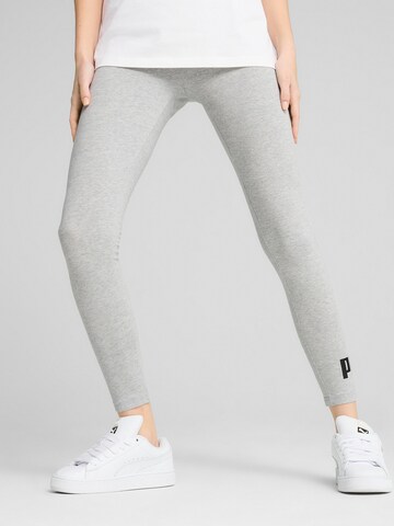 Skinny Pantaloni sportivi 'Ess No. 1' di PUMA in grigio
