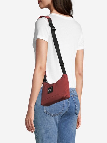 Calvin Klein Jeans Crossbody Bag in Brown