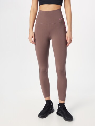 Skinny Pantalon de sport NIKE en violet : devant