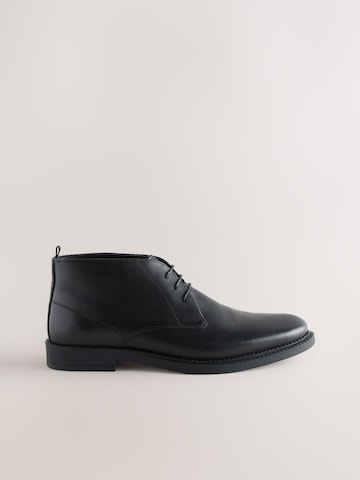 Next - Botines chukka en negro